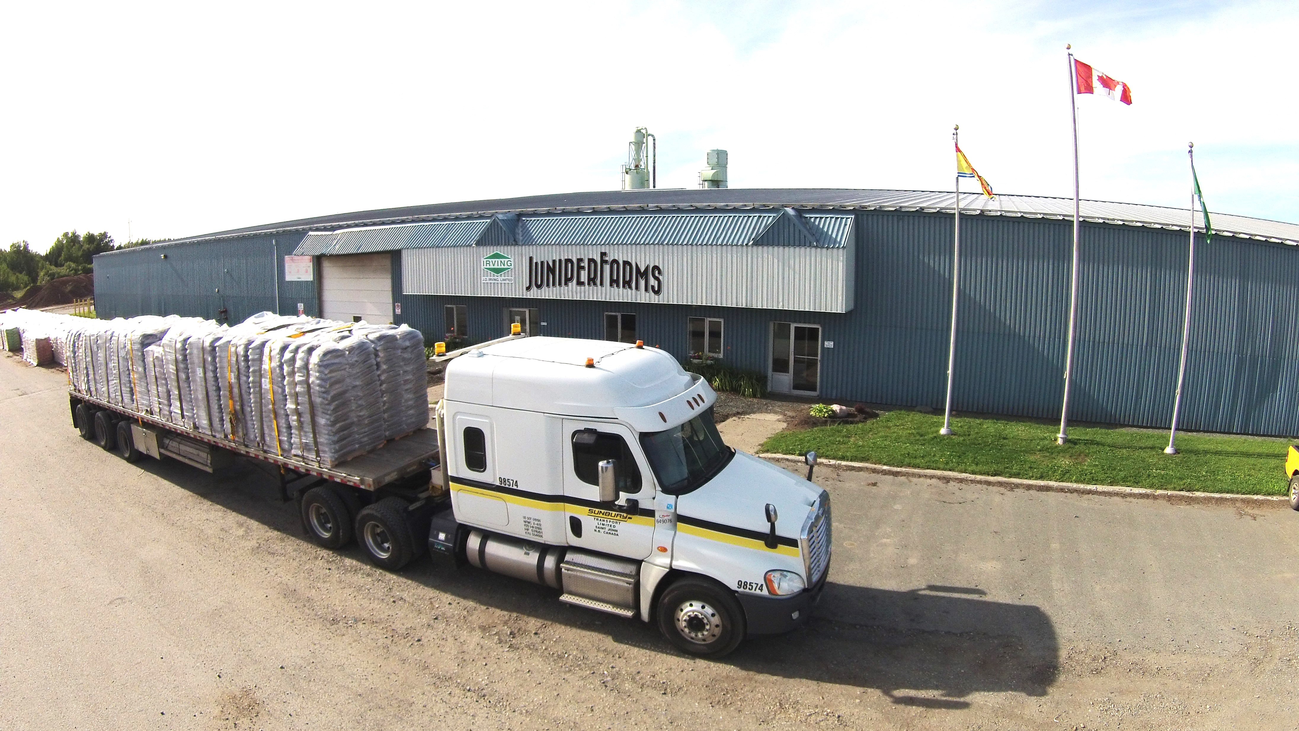 A transport truck loaded with products for delivery